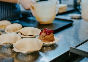 Our Lochinver Larder Pie Maker assembling some Venison and Cranberry pies